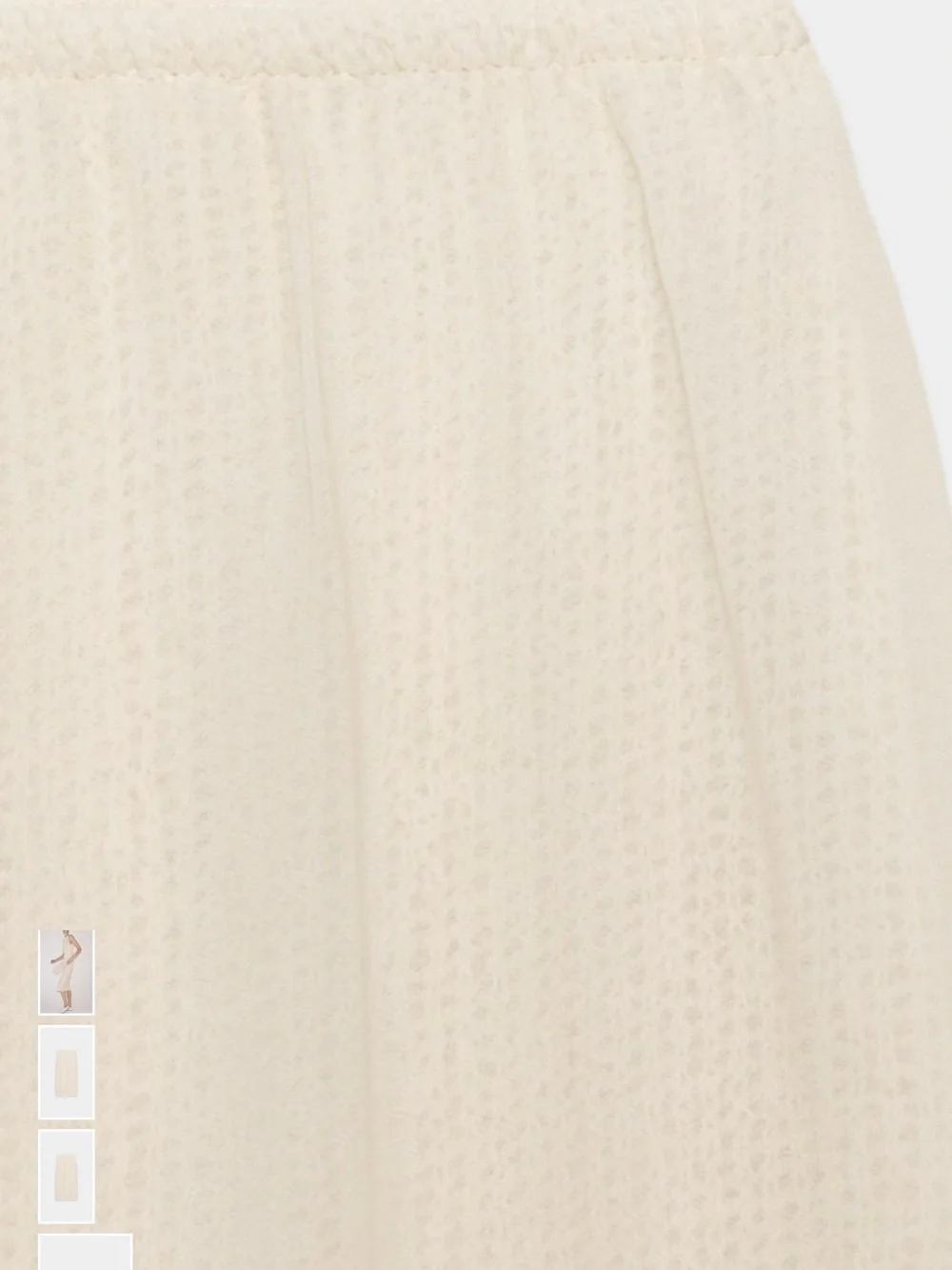 Mid-rise midi skirt with elastic waistband. Double effect detail NWT